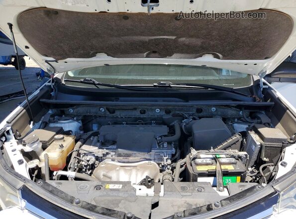 JTMZFREVXJJ748135 2018 TOYOTA RAV4 White Rear interior view