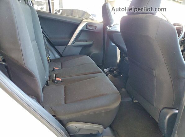 JTMZFREVXJJ748135 2018 TOYOTA RAV4 White Rear seats view