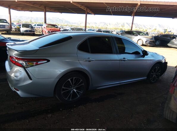 JTNB11HK7J3051606 2018 TOYOTA CAMRY Silver Vista interior trasera