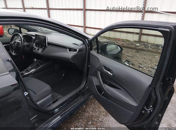 JTND4MBE1M3108164 2021 TOYOTA COROLLA Black Front interior view