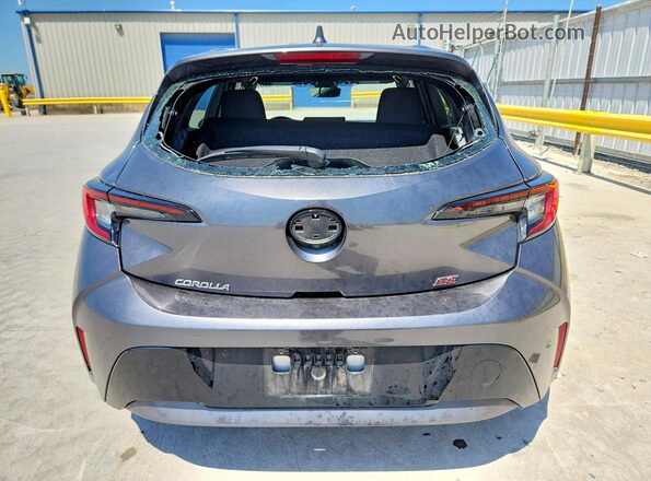 JTND4MBE3P3207038 2023 TOYOTA COROLLA Серый Вид сзади
