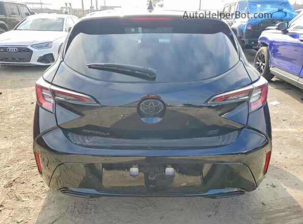JTND4MBE5M3129485 2021 TOYOTA COROLLA Black Rear view