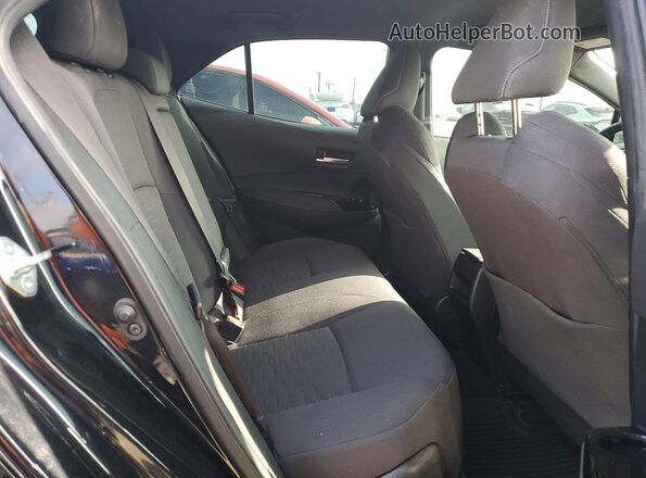 JTND4MBE5M3129485 2021 TOYOTA COROLLA Black Rear seats view
