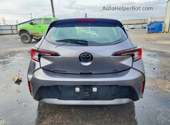 JTND4MBE5P3197290 2023 TOYOTA COROLLA Gray Vista trasera
