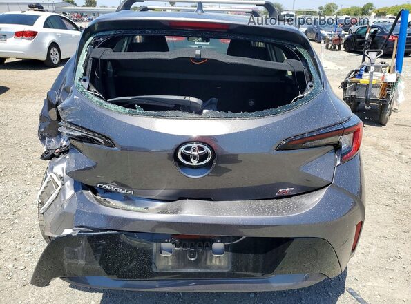 JTND4MBE6P3201220 2023 TOYOTA COROLLA Gray Rear view