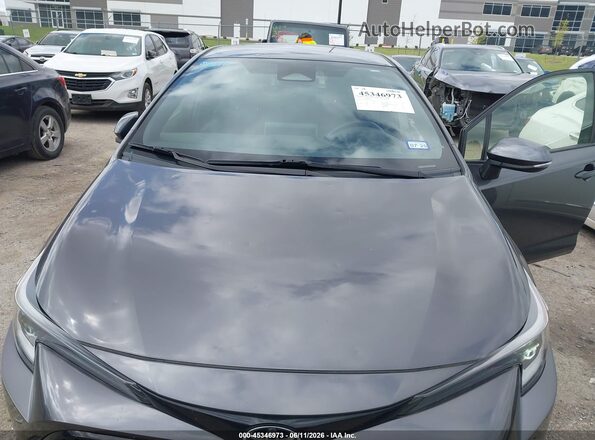 JTND4MBE6P3208541 2023 TOYOTA COROLLA Gray Front view