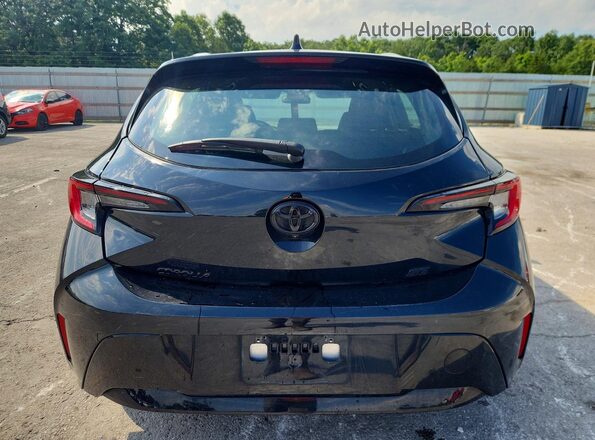 JTND4MBE9R3220833 2024 TOYOTA COROLLA Black Вид ззаду