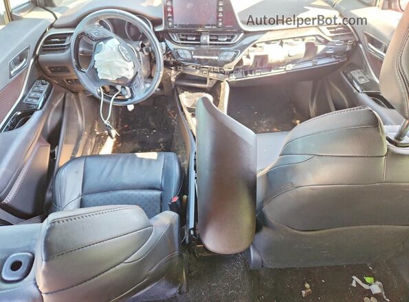 JTNKHMBX0K1014301 2019 TOYOTA C-HR Red Dashboard view