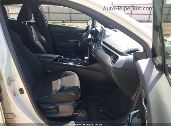 JTNKHMBX8K1014398 2019 TOYOTA C-HR White Вид салону спереду