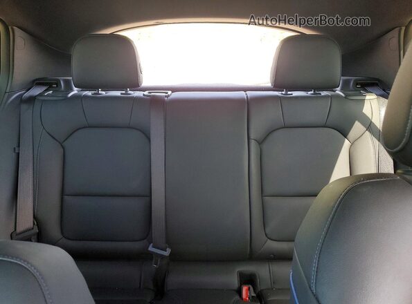 KL47LBE2XRB035197 2024 BUICK OTHER Orange Rear seats view