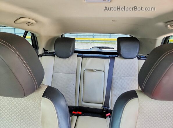 KL4CJASB3JB513306 2018 BUICK ENCORE Beige Vista de los asientos traseros