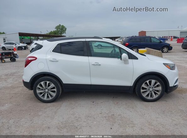 KL4CJASB7JB664441 2018 BUICK ENCORE White Vista interior trasera