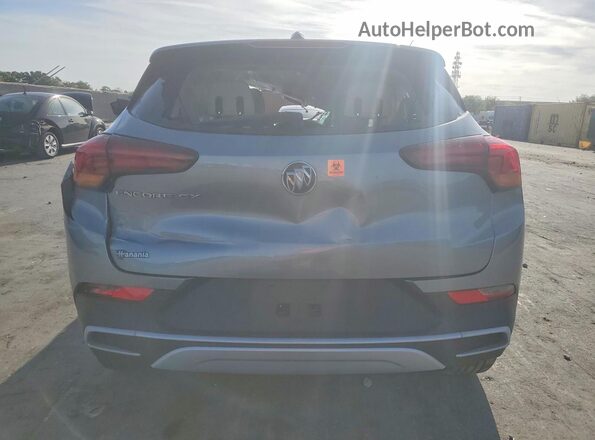 KL4MMBS26PB158612 2023 BUICK ENCORE Silver Rear view