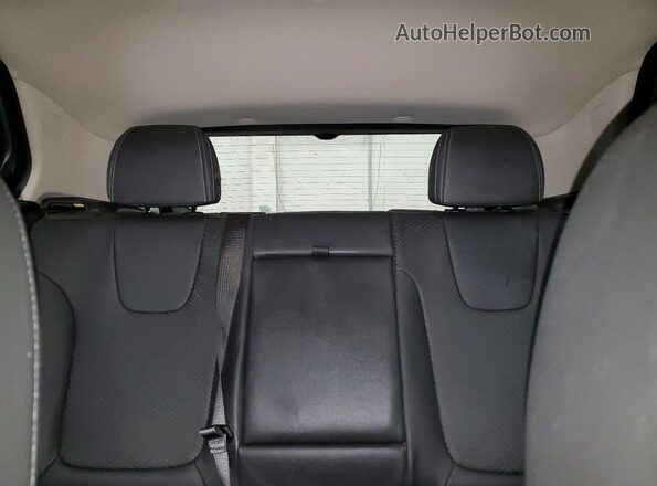KL4MMGSL8NB045666 2022 BUICK ENCORE Orange Vista de los asientos traseros
