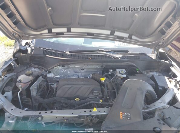 KL77LFE29RC021201 2024 CHEVROLET TRAX Gray Rear view
