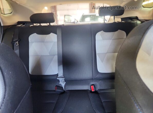 KL77LFE2XRC077096 2024 CHEVROLET TRAX Red Հետևի նստատեղերի տեսք