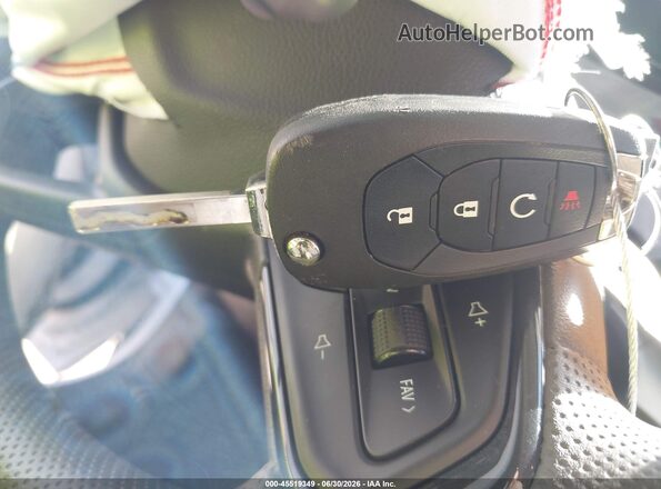 KL77LFEP0TC022028 2026 CHEVROLET TRAX Белый Вид панели приборов