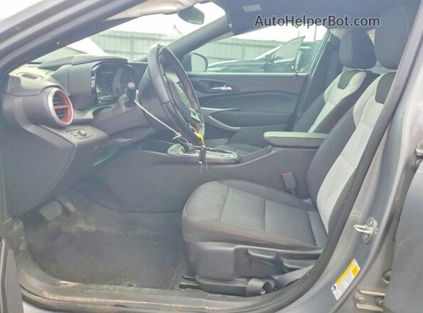 KL77LGE22RC070746 2024 CHEVROLET TRAX Silver Front interior view