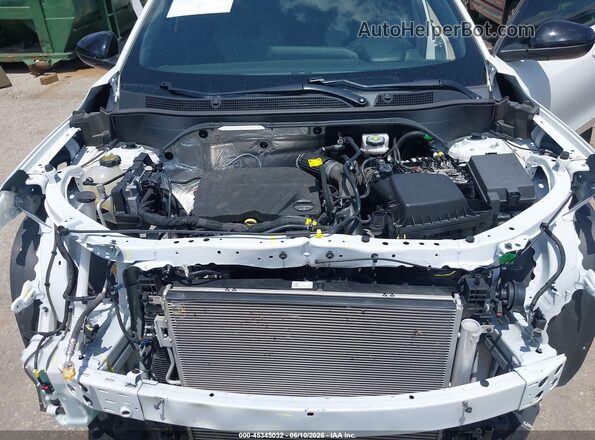 KL77LGE29RC026985 2024 CHEVROLET TRAX White Rear view