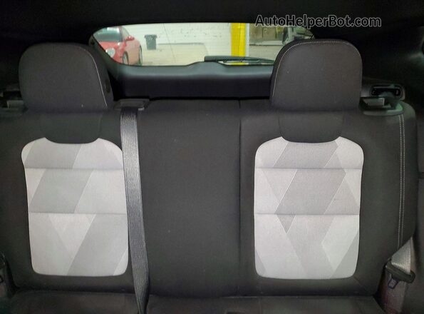 KL77LGEP8SC135956 2025 CHEVROLET TRAX Burgundy Rear seats view