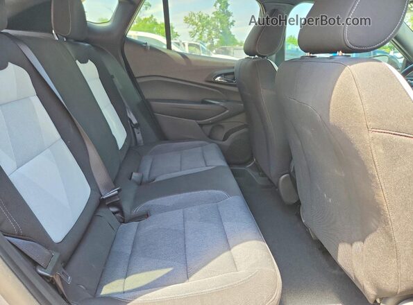 KL77LGEP9SC007385 2025 CHEVROLET TRAX Silver Rear interior view