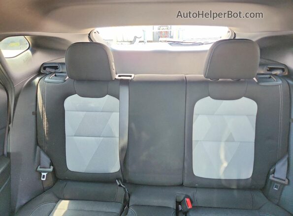 KL77LGEP9SC007385 2025 CHEVROLET TRAX Silver Rear seats view