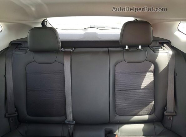 KL77LHE24RC083472 2024 CHEVROLET TRAX Red Widok tylnych siedzeń