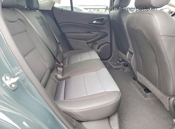 KL77LHEP5SC254103 2025 CHEVROLET TRAX Green Rear interior view