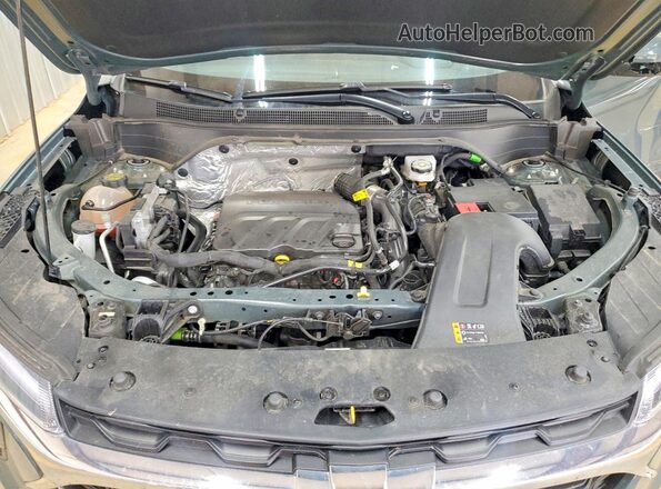 KL77LHEP7SC157761 2025 CHEVROLET TRAX Бирюзовый Вид задней части салона