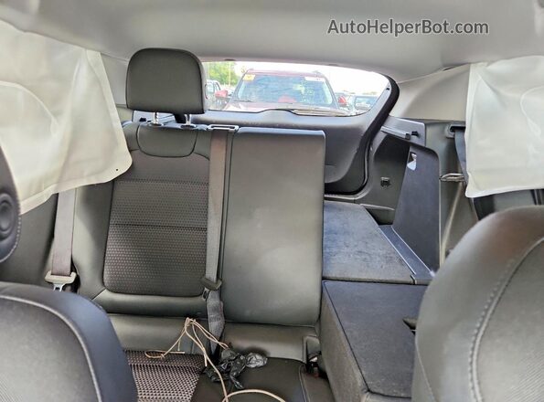 KL77LHEP8SC243077 2025 CHEVROLET TRAX Серебряный Вид задних сидений