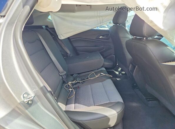 KL77LHEP8SC243077 2025 CHEVROLET TRAX Серебряный Вид задней части салона