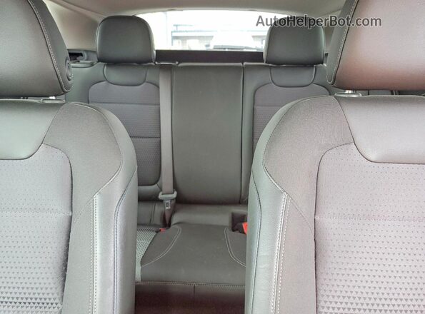 KL77LHEP9SC282812 2025 CHEVROLET TRAX Maroon Rear seats view