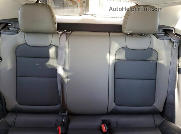 KL77LKEP3SC023746 2025 CHEVROLET TRAX White Vista de los asientos traseros