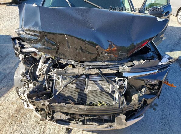 KL79MPSL3RB135581 2024 CHEVROLET TRAILBLAZER Black Engine compartment view