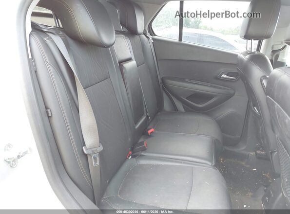 KL7CJLSB0HB134384 2017 CHEVROLET TRAX Silver VIN sticker view