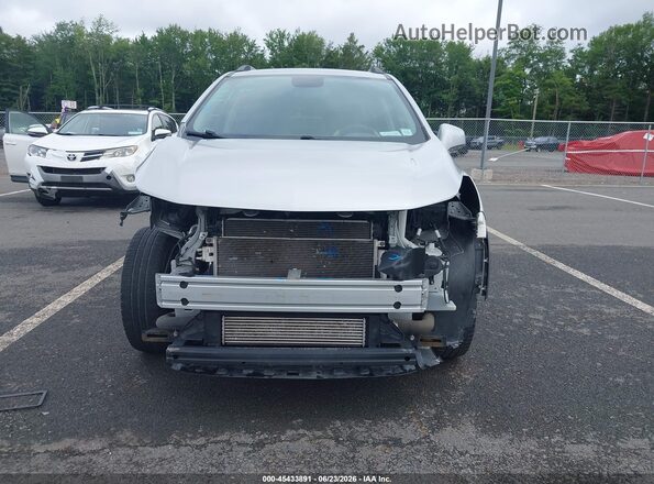 KL7CJPSB7MB323034 2021 CHEVROLET TRAX Silver Vista interior trasera