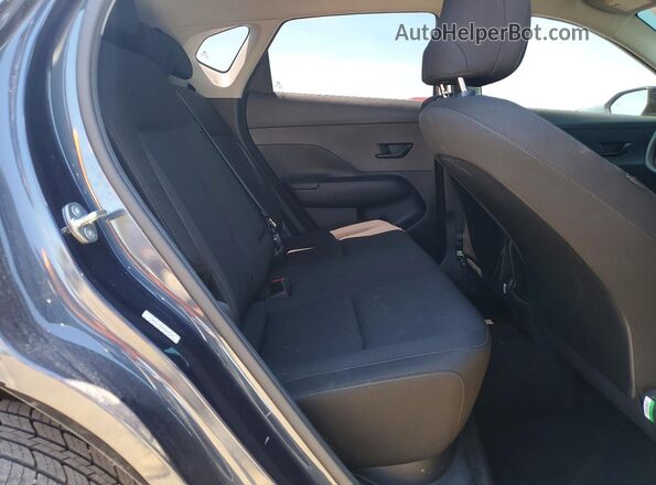 KM8HACAB3RU048322 2024 HYUNDAI KONA Charcoal Vista interior trasera