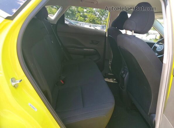 KM8HC3A63RU005824 2024 HYUNDAI KONA Yellow Rear interior view