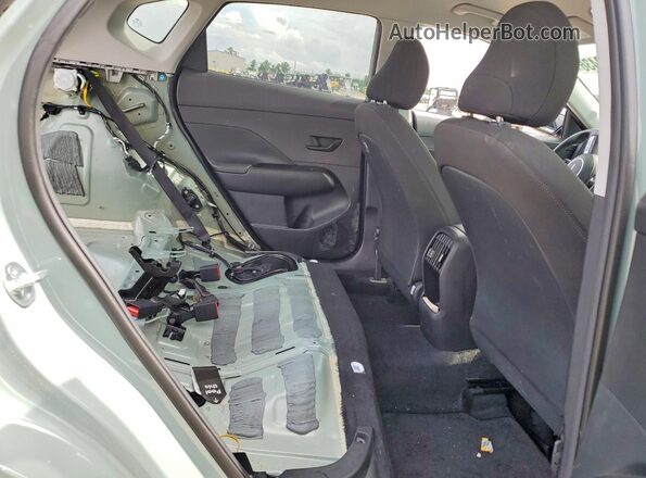 KM8HC3AB5SU214839 2025 HYUNDAI KONA Turquoise Rear interior view