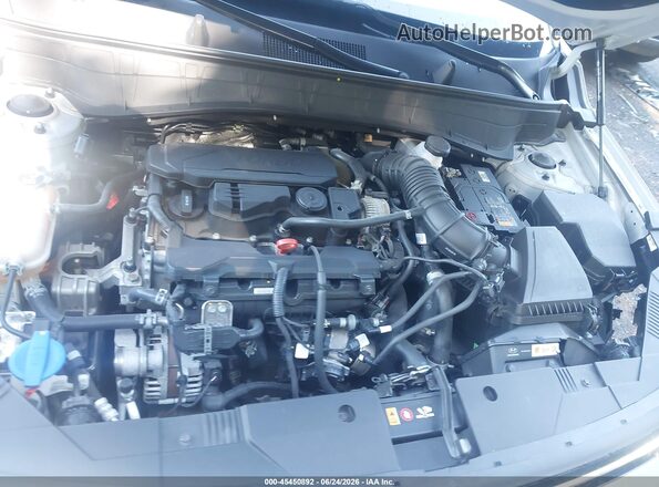 KM8HECA38RU052475 2024 HYUNDAI KONA Gray Rear view