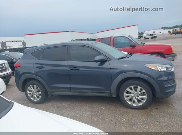 KM8J23A42LU151481 2020 HYUNDAI TUCSON Gray Vista interior trasera