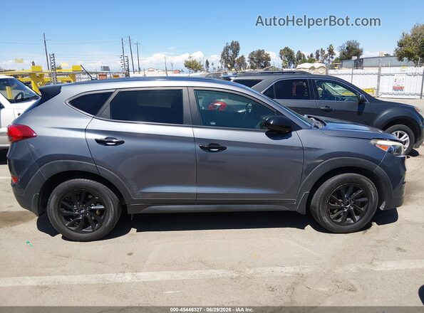 KM8J23A44JU607185 2018 HYUNDAI TUCSON Серый Вид задней части салона