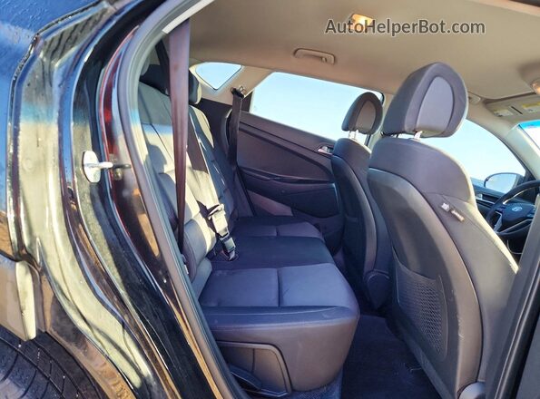 KM8J23A45HU566060 2017 HYUNDAI TUCSON Black Vista interior trasera