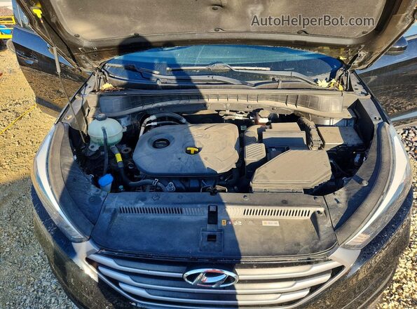 KM8J23A45HU566060 2017 HYUNDAI TUCSON Black Vista del compartimento del motor