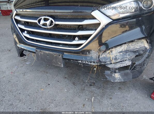 KM8J23A47HU565699 2017 HYUNDAI TUCSON Black Front view