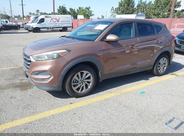 KM8J23A49GU098901 2016 HYUNDAI TUCSON Brown Առջևի ձախ երեք քառորդ տեսարան