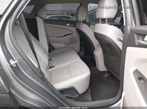 KM8J2CA41KU868677 2019 HYUNDAI TUCSON Gray VIN կոդի պիտակի տեսք