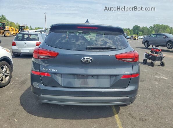 KM8J2CA41KU955091 2019 HYUNDAI TUCSON Blue Rear view