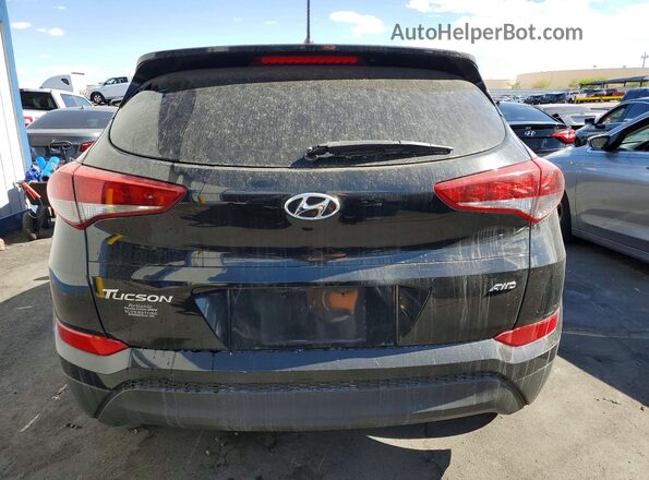 KM8J2CA44JU780883 2018 HYUNDAI TUCSON Black Vista trasera