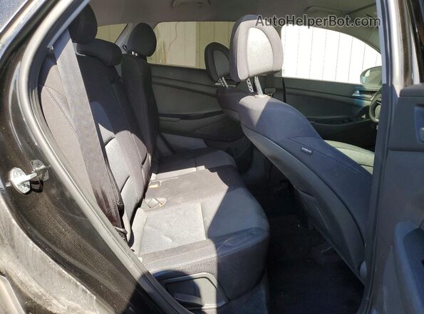 KM8J2CA44JU780883 2018 HYUNDAI TUCSON Black Vista de los asientos traseros